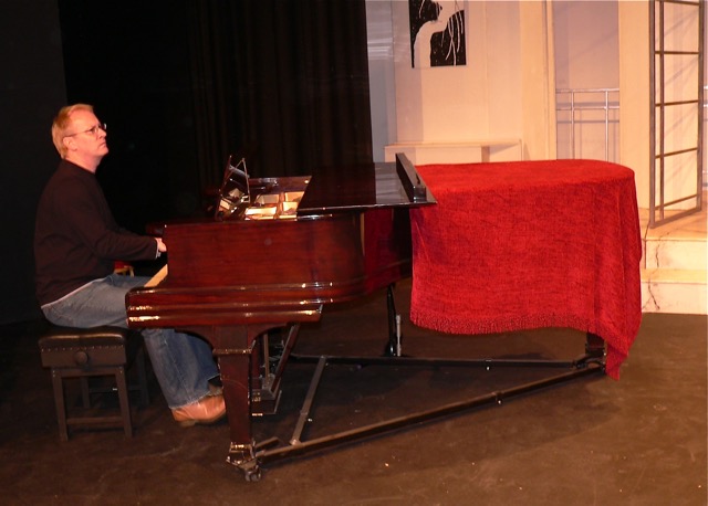 Stephen Powell (Musical Director) at the piano